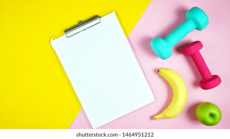 Healthy Lifestyle Prescription For Good Health Concept Flatlay With Stethoscope, Healthy Food, And Exercise Equipment On Modern Pastel Background.