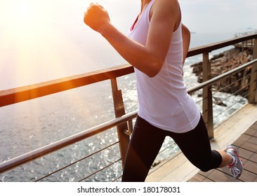 Healthy Lifestyle Sports Woman Running On Wooden Boardwalk Seaside