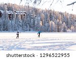 Healthy lifestyle. Winter sport skiing. Winter lake in Kuusamo Ruka. Finland.