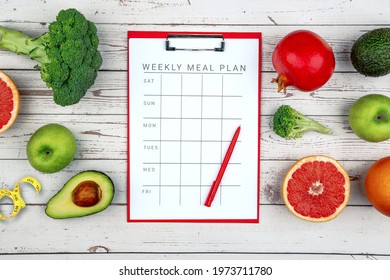 Healthy Lifestyle Workout Concept With Training Equipment. The Idea Of How To Achieve Harmony And Longevity While Slimming. Weekly Meal Plan Tab