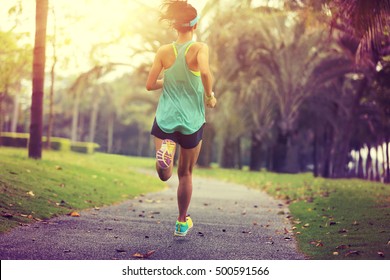 Healthy Lifestyle Young Sporty Asian Woman Running At Tropical Park