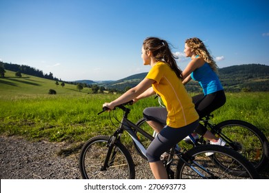 Healthy Lifestyle - Young Women Biking