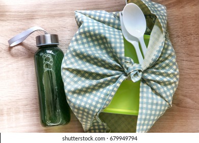 Healthy Lunch Box Wrapped  By Japanese Wrapping Cloth Furoshiki Style With Green Vegetables And Fruits Juice Bottle , Homemade  Healthy  Lunch Box Set For Diet And Healthcare Concept