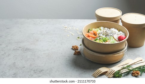 Healthy Lunch - Rice With Salmon In Take Away Food Bowls In Sustainable Reusable Containers On Grey Kitchen Table. Modern Eco-friendly Food Delivery. Banner. Copy Space 