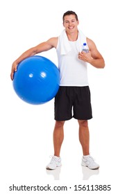 Healthy Man Holding A Gym Ball Isolated On White