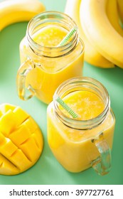 Healthy Mango Pineapple Smoothie In Mason Jars