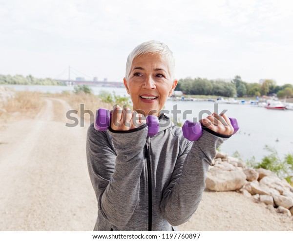 Healthy Mature Woman Exercise Weights Grayshort Stock Photo Edit