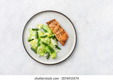 A Healthy Meal On Plate, Salmon, Green Salad, Vegetables.