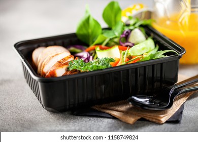 Healthy Meal Prep Containers With  Chicken And Vegetable Salad.