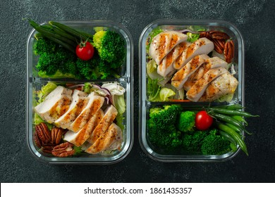 Healthy Meal Prep Containers With Green Beans, Chicken Breast And Broccoli. A Set Of Food For Keto Diet In Lunchbox On A Dark Concrete Background. Top View