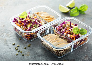 Healthy meal prep containers with quinoa, chicken and cole slaw - Shutterstock ID 791066053