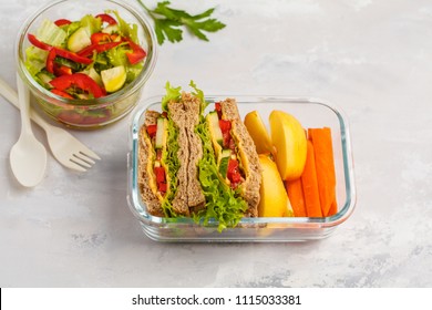 Healthy Meal Prep Glass Containers With Cheese Vegetables Sandwiches And Vegetable Salad Overhead Shot With Copy Space