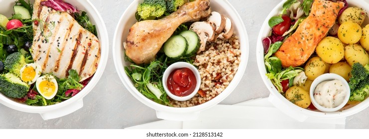 Healthy meal prep in lunch boxes on light background. Dieting eating concept. Flat lay, top view, panorama