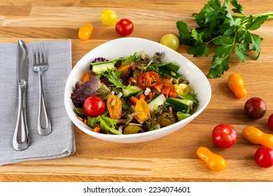 Healthy meal, salad bowl, vegetables, tomatoes for lunch - Shutterstock ID 2234074601