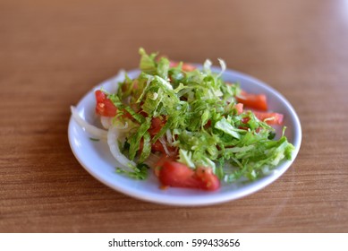 Healthy Mediterranean Salad With Tomato, Lettuce And Onion