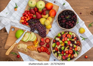 
Healthy Mixed Fruit Salad (Blackberry, Banana, Peach, Nectarine, Strawberry, Apple, Apricot, Grape, Min) On A Crockery Bowl, A Heap Of Summer Fruits Concept, Healthy Vitamins. Organic.