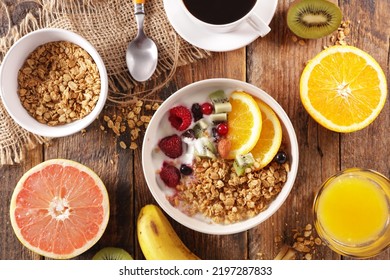 Healthy Morning Breakfast With Granola, Fruits And Coffee Cup