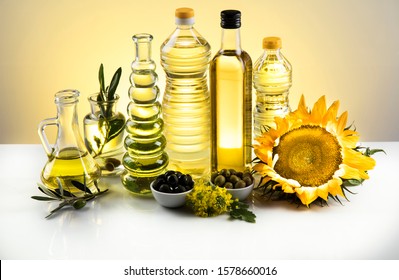 Healthy oil from sunflower, olive, rapeseed oil. Cooking oils in bottle - Shutterstock ID 1578660016