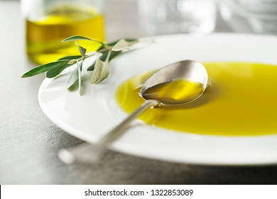 Healthy olive oil pouring with spoon close up-image concept