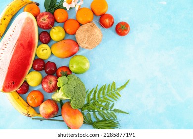 Healthy organic food background. Studio photo of different fruits  and vegtables on white background. High resolution image. Food photography of different fruits isolated blue background 