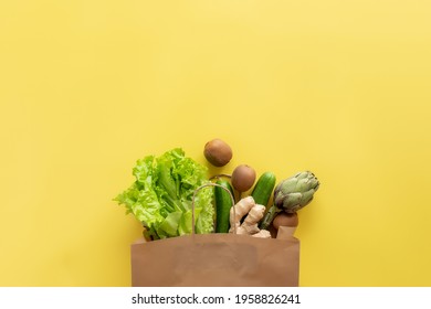 Healthy And Organic Food Flay Lay Concept On Yellow Background