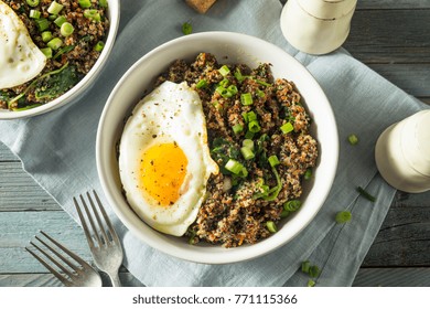 Healthy Organic Quinoa Breakfast Bowl With Onion And Egg