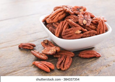 Healthy Pecan Nut Halves In White Dish