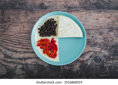 Healthy Plant-based Food Recipes, Vegan Version Fo The Viral Layered Tortilla Wrap Hack With Red Peppers Grated Dairy-free Cheese Avocado And Black Beans