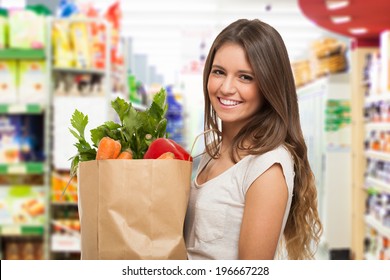 Healthy Positive Happy Woman Holding A Paper Shopping Bag Full Of Fruit And Vegetables