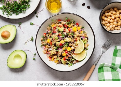 Healthy Quinoa Black Bean Salad With Mango And Avocado. Perfect For Spring, Summer, Fall Or Winter. Gray Stone Background, Top View. 