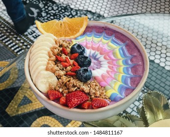 Healthy Rainbow Smoothies Bowl With Fresh Fruit And Granola