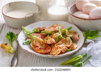 Healthy Roasted Pumpkin Flower Made Of Pancake Batter. Deep Fried Yellow Squash Flower.