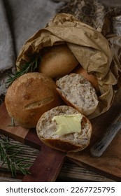 Healthy rosemary dinner bread buns with wholemeal flour - Shutterstock ID 2267725795
