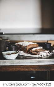 Healthy Rye Swedish Bread Loaf Cut In Slices Covered With Flour With Vintage Knife On Cotton Towel Over Kitchen Counter, Selective Focus