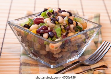 Healthy Salad Made With Red Kidney Beans, Black Eyed Peas, Corn, Spring Onions, Chickpeas, Celery, And Seasoning.