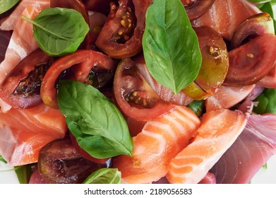 Healthy Salad With Raw Salmon, Tuna, Green Salad, Tomato, Basil 