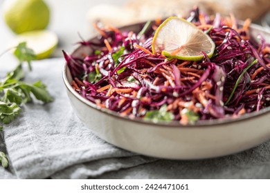 Healthy salad of red cabbage, carrots, coriander and sesame.  Healthy eating, vegan food concept. - Powered by Shutterstock