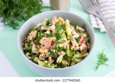 Healthy Salad With Tuna And Fresh Green Vegetables (cucumber, Chives, Dill) In Bowl On Green Background, Overhead View.