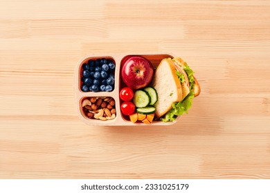 https://image.shutterstock.com/image-photo/healthy-school-lunch-box-fruits-260nw-2331025179.jpg