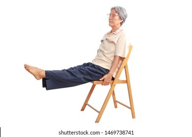 Healthy senior Asian women doing exercises with chair, sport elderly lady practice yoga isolated on white background, Mature female warms up muscles, body flexibility and fitness lifestyle concept.