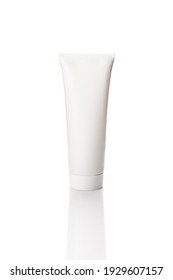 Healthy and skincare concept. Cosmetic lotion in white tube packaging on white background.