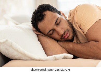 Healthy Sleep. Arabic Man Napping Holding Hands Behind Head Sleeping In Cozy Bedroom. Closeup Of Male Resting Lying In Bed At Home. Recreation, Relaxation And Rest Concept