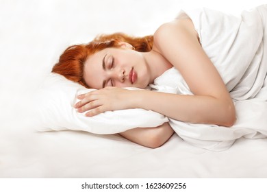 Healthy Sleep. A Woman Is Sleeping In The Bed. Girl In The Bedroom At Night. Proper Sleep Patterns And Hormone Melotonin