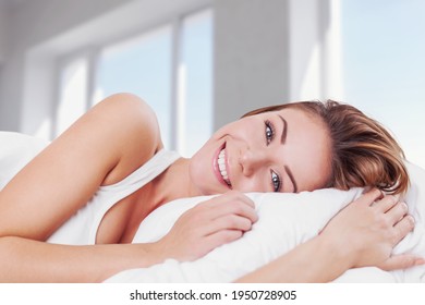 Healthy Sleeping, Sleep Hygiene Concept. Smiling Pretty Young Woman In Her Bed At Home,