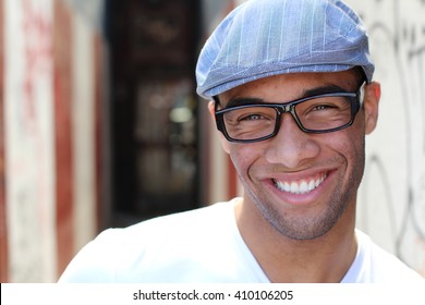 Healthy Smile. Teeth Whitening. Beautiful Smiling Young Man Portrait Close Up. Over Modern Corridor Background . Laughing Businessman With Perfect Shin. Copy Space For Text.