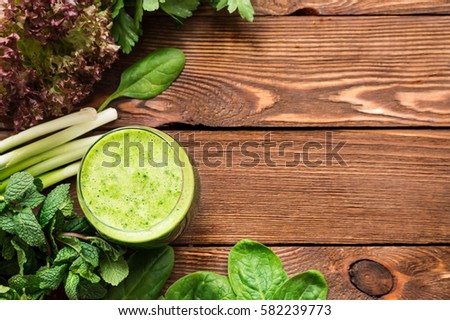 Similar – Foto Bild Grünkohl Smoothie im Glas auf weißem Holzgrund.