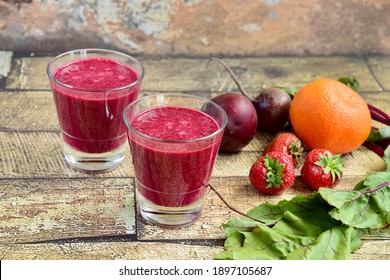 Healthy Smoothie Made From Beetroot, Strawberry, Orange, Beetroot Leaves And Hemp Seeds