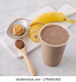 Healthy Smoothie With Peanut Butter, Almond Milk, Banana And Cocoa.