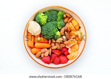 Healthy Snack Bowl with Fruit Nuts and Veggies