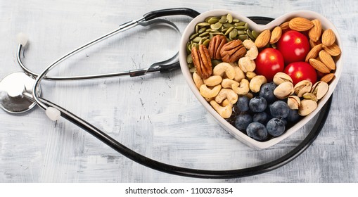 Healthy Snack In Heart Shaped Bowl. Top View